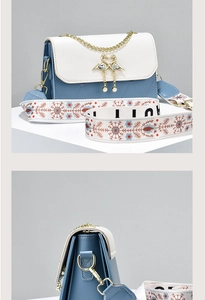 Detail of blue quilted leather bag with flamingo buckle and embroidered strap