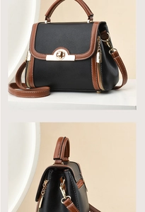 Detail of contrast color crossbody bag with gold twist lock and lychee grain texture