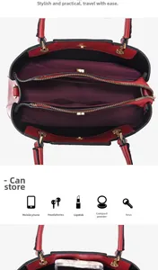 Detailed interior of red bridal tote bag showing multi-compartment storage and black lining