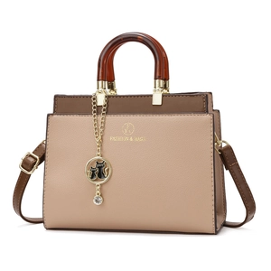 Elegant contrast tote bag with amber handle, cat charm and detachable shoulder strap
