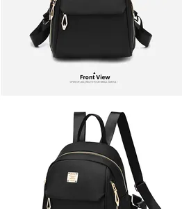 Vue détaillée d'un sac à dos en nylon noir avec des fermetures éclair en métal doré chic