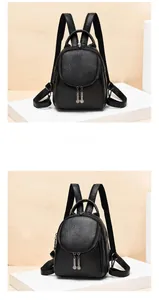 Close-up of black lychee texture leather mini backpack with metal zipper charms