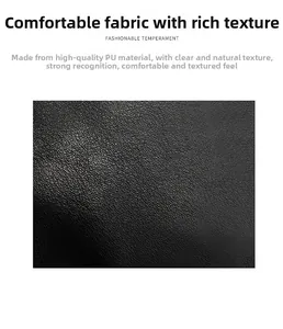 Detailed macro shot showing black PU leather material with a soft lychee texture and subtle gloss