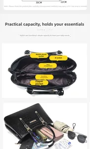 Detail view of the 30cm wide black crocodile embossed tote bag with multi-pocket interior