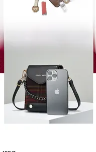 Size comparison of retro plaid crossbody mini bag next to a smartphone for scale