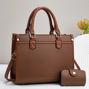 Brown lychee texture leather tote bag set with matching wallet and golden hardware
