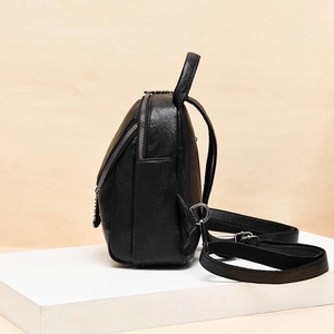 Black lychee texture PU leather mini backpack with adjustable straps and silver hardware