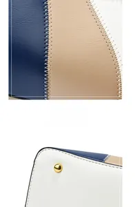 Gros plan d'un sac en cuir tricolore avec surpiqûres en zigzag et ferrures en métal doré