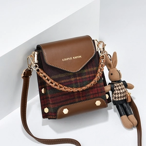 Vintage crossbody mini bag with red-green plaid pattern and a cute rabbit pendant