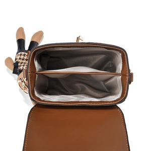 Brown leather crossbody square bag with internal compartments and a bear charm