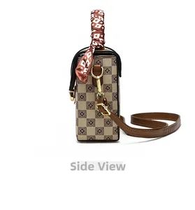 Side view of mini crossbody phone bag featuring checkerboard pattern and silk scarf handle