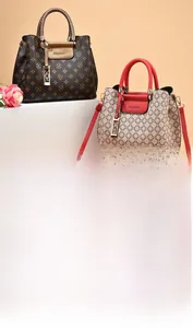 Detail of elegant patterned tote bags displayed on geometric steps with floral accents