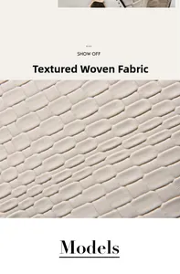 Close-up of textured woven fabric and premium material detail on the white square bag
