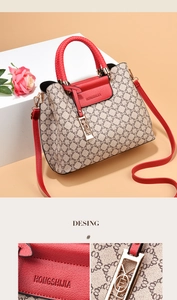 Detail of red woven handles and textured leather on a chic beige patterned tote bag