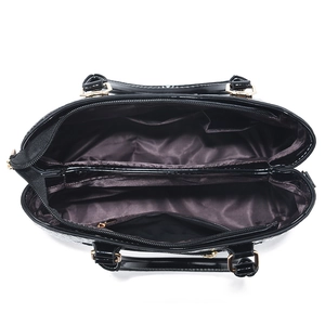 Top view of large black crocodile embossed handbag showing spacious multi-layer interior