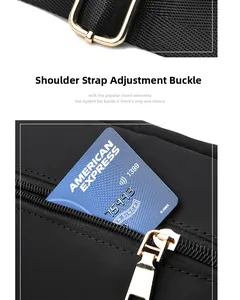 Detail of adjustable gold buckle and side pocket on black oxford fabric crossbody bag
