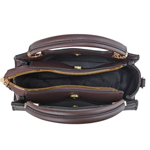 Classic large capacity handbag showing three internal compartments and golden hardware