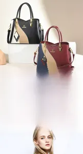 Detailed view of bicolor leather tote bags with butterfly charms and brand lettering