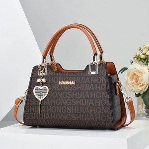 Large capacity dark brown monogram tote bag with top handles and pearl heart charm