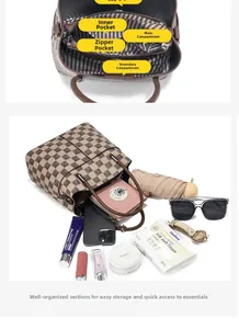 Detailed interior of a brown checkered bucket bag showing large capacity and compartments