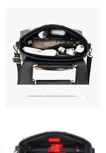Detail view of the black leather handbag interior with multi-layer storage compartments