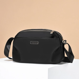 Waterproof black nylon crossbody bag for middle-aged women with multi-layer zipper design