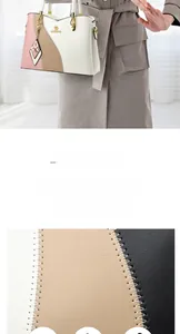 Detail of color-block cowhide leather handbag with fine stitching and metal butterfly charm