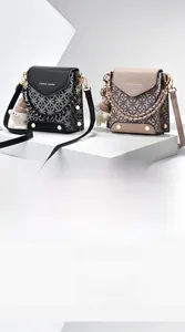 Detailed view of crossbody bags featuring geometric textures, rivets and plush charms