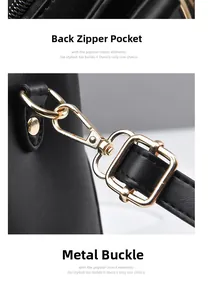 Detail of stone textured leather bag featuring gold metal buckle and back zipper pocket