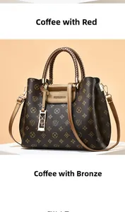 Detail of monogram leather tote bag with woven handles and golden brand hardware