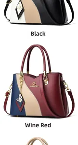 Detail of color-block leather handbags in black and wine red with butterfly pendant