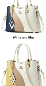 Macro shot of two-tone luxury leather handbags with JANENOVO logo and metallic butterfly charm
