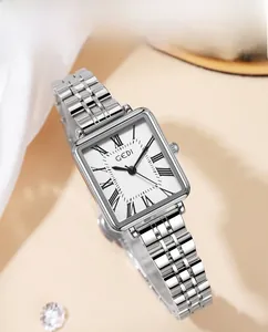 Detail of GEDI rectangular silver watch with roman numerals on white satin background