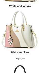 Detailed view of color-block tote bag with adjustable strap and decorative white butterfly charm
