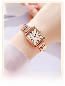 Close-up of GEDI vintage square rose gold watch with Roman numerals on a model wrist