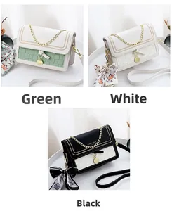 Detail of crossbody bags with woven texture, metal chains and decorative floral scarves