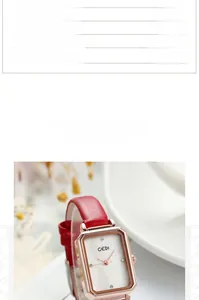 Detail of elegant rectangular quartz watch with red leather strap and 3ATM waterproof scale