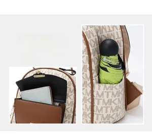 Detail view of cream backpack showing side pocket storage for umbrella and wallet