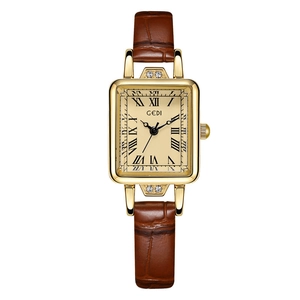 Elegant vintage rectangular women's watch with gold case and brown leather strap
