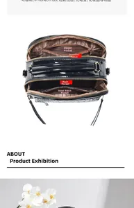 Détail de la structure interne multicouche du sac brillant avec motif crocodile noir