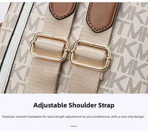 Detail of adjustable fabric strap with gold metal buckle on MK monogram backpack