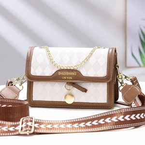 Quilted beige and brown crossbody bag with gold chain and printed wide strap