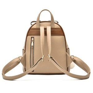 Back view of beige faux leather fashion backpack with adjustable straps and zipper pocket