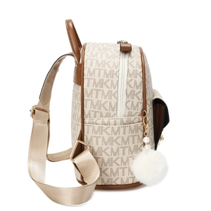 Chic cream mini backpack with brown trim and monogram print shown in side profile