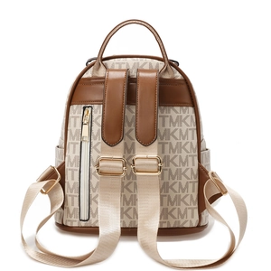 Monogrammed beige backpack with brown leather trim and golden hardware zippers