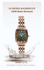 Detailed view of square rose gold watch showing 3ATM water resistance with water splashes