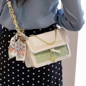 Chic cream and green color-block crossbody bag with gold chain and silk scarf handle