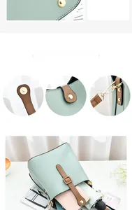Détail de l'intérieur spacieux du sac seau vert menthe avec les objets essentiels
