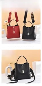 Detail of soft leather bucket bags in black and red with stylish wide shoulder straps