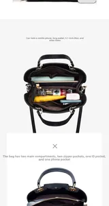 Innenraum der schwarzen Handtasche mit Fächern für iPad, Handy und Geldbörse im Detail